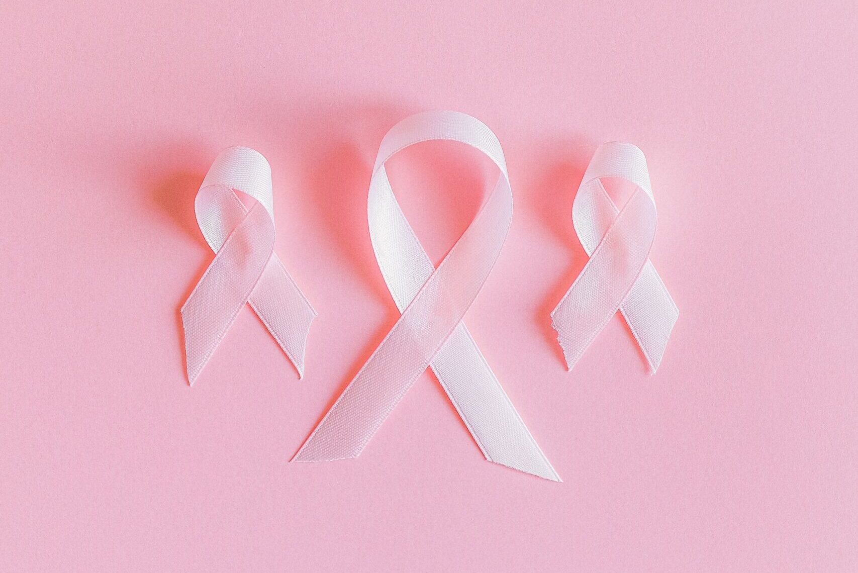 Set of three pink breast cancer ribbons to encourage mammograms
